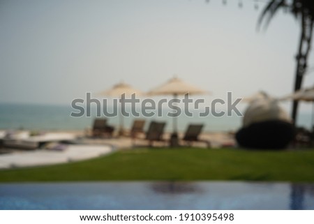 Abstract blur beautiful hotel resort and swimming pool background for travel and vacation