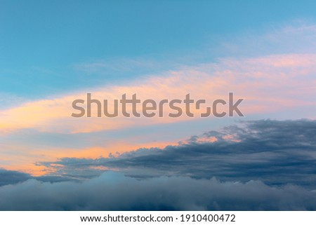 The first or last rays of the sun on the pass. Morning and evening in nature. Colorful sunset and sunrise. A sky with rich colors and clouds