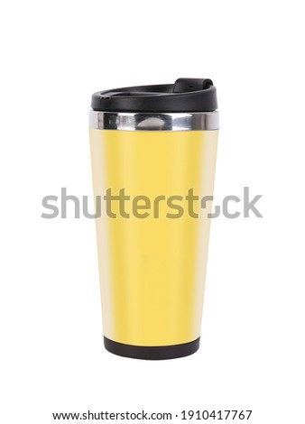 To go smoothie cup. Yellow color reusable mug and tumbler made of plastic and metal. Traveler tumbler. Royalty-Free Stock Photo #1910417767