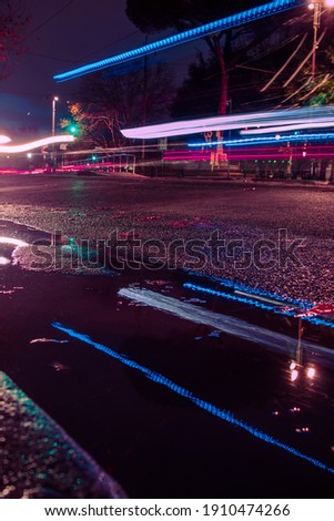 traffic at night. Long exposure photography of cars passing in the city