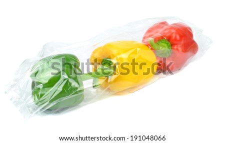 Fresh prepacked paprika peppers sealed in a cellophane bag  Royalty-Free Stock Photo #191048066