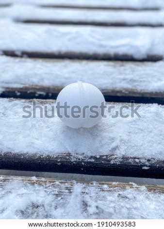 snowball on a wooden bridge