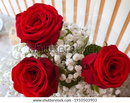 A bouquet of red roses, with love.
