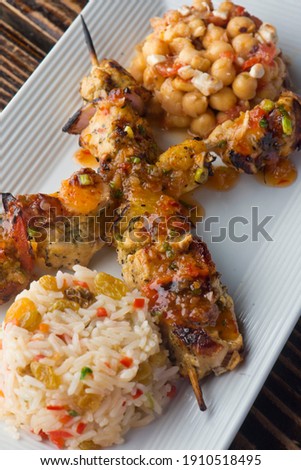 Chicken Kabobs. Cubes of grilled chicken, grilled vegetables, onions bell peppers and seasoned with garlic and spices. Served with rice, traditional classic Greek or Italian restaurant favorite. 