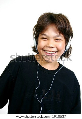 Portrait of young boy listening to the music.