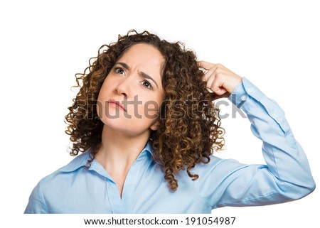 Closeup portrait young woman, scratching head, thinking, daydreaming deeply about something, looking up, isolated white background. Human facial expressions, emotions, feeling, sign, symbols, reaction