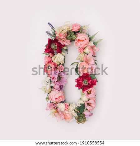 Letter O or number 0 made of real natural flowers and leaves. Flower font concept. Unique collection of letters and numbers. Spring, summer and valentines creative idea. Royalty-Free Stock Photo #1910558554