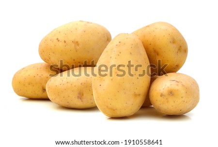 New potato isolated on white background close up  Royalty-Free Stock Photo #1910558641