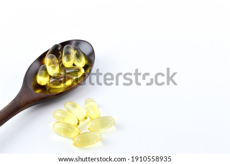 Pile of pills or capsules isolated on a white background. Drugs and medical concept.