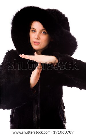 Young woman making time out signal with hands