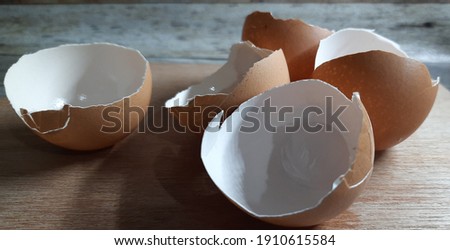A collection of Eggshells on wooden table