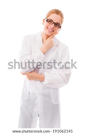 Female scientist smiling with her hand on chin