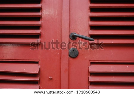 the old red door is waiting to open