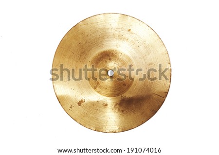 Music conceptual image. Close up of an old cymbal on isolated background. Royalty-Free Stock Photo #191074016