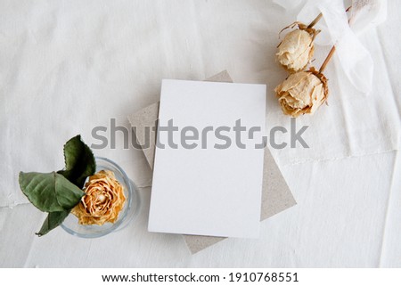 Vintage fashion white background and blank postcard - white background, yellow roses and copy space. A romantic greeting card. Wedding feminine invitation.