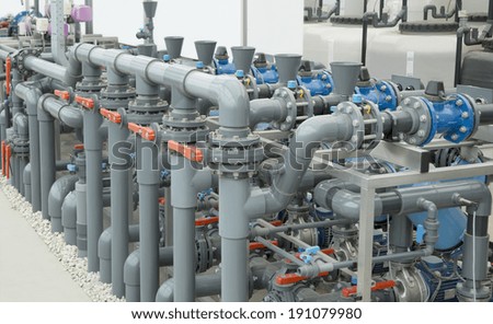 Liquid fertilizer system for greenhouse plants Royalty-Free Stock Photo #191079980