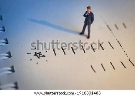 Business decision concept. Businessman thinking with promote chart