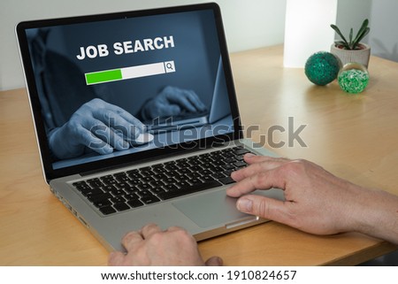 man searching online for a job