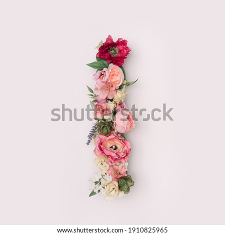 Letter I made of real natural flowers and leaves. Flower font concept. Unique collection of letters and numbers. Spring, summer and valentines creative idea. Royalty-Free Stock Photo #1910825965