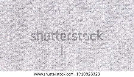 Natural linen texture as background Royalty-Free Stock Photo #1910828323