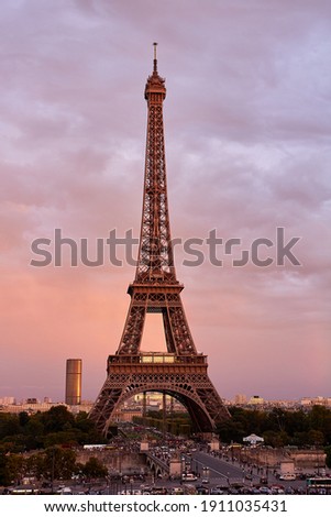 Eiffel Tower at sunset from enhanced view, Paris skyline in the background