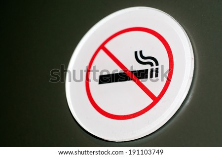No smoking sign and symbol  on a wall.No people. Copy space 