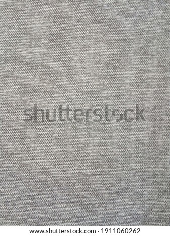 Gray knitting wool pattern background and texture

