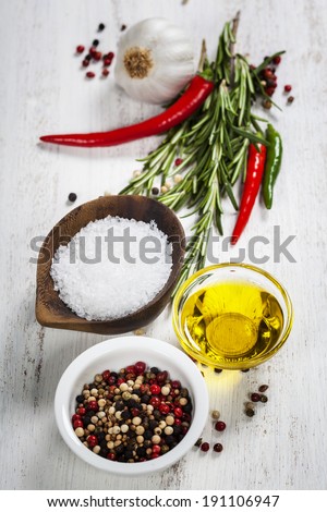Herbs and spices on wooden board