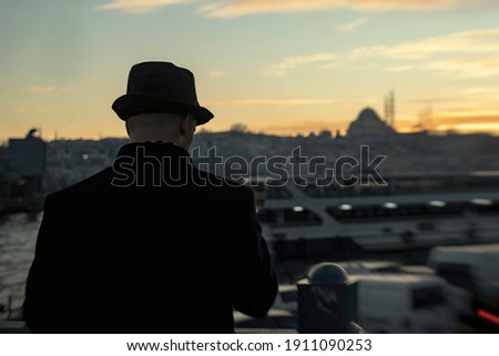 istanbul skyline and a man.