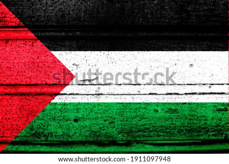 National flag of Palestinian Territory, abbreviated with ps; a realistic 3d image of the national symbol from an independent country painted on a wooden wall