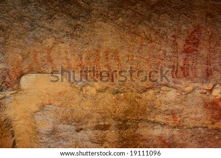 african aboriginal busmen family (San people) migrating. tribal rock art drawing in mountains of south africa (western cape)
