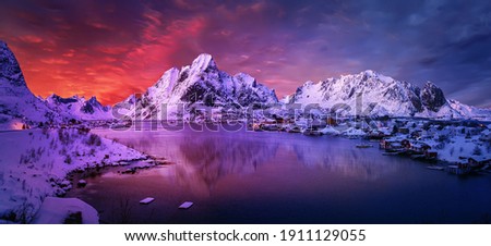 Magical evening in Lofoten. North fjords with mountains landscape. scenic photo of winter mountains and vivid colorful sky. stunning natural background. Picturesque Scenery of Lofoten islands. Norway Royalty-Free Stock Photo #1911129055