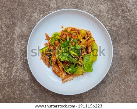 Chinese Shandong Spicy Chicken with Soy Sauce, Vinegar, Sugar, Cucumbers and Cilantro Royalty-Free Stock Photo #1911156223