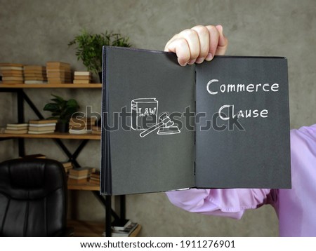 Business concept meaning Commerce Clause with inscription on the sheet.
 Royalty-Free Stock Photo #1911276901