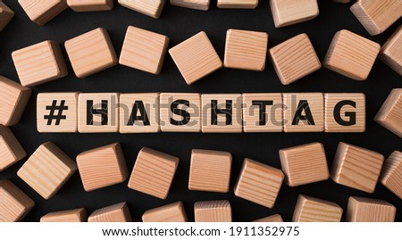 Word HASHTAG made with wood building blocks