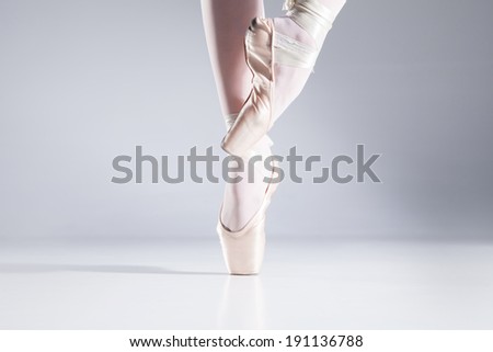 Ballet On Toes. Legs of a graceful ballet dancer en pointe on toes.