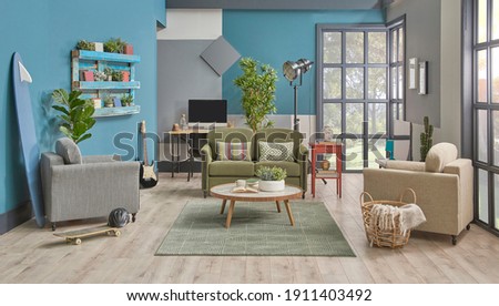 Blue and grey wall background green furniture sofa and armchair, working table background, poster wooden bookshelf, interior room design.