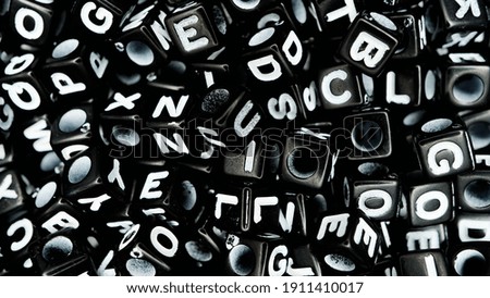 black alphabet cube. macro close up photography