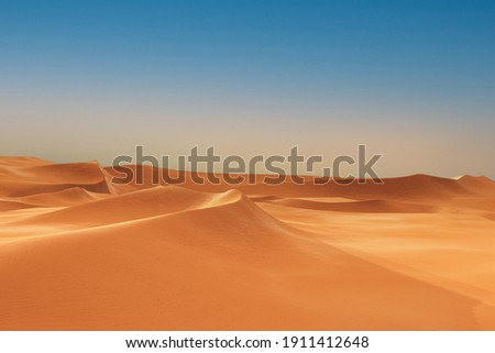 desert landscape dunes with blue sky. Sand mounds formed in circular shape, beauty of natural changes over great stretches Royalty-Free Stock Photo #1911412648