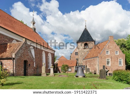 Little church in Greetsiel, Northern Germany Royalty-Free Stock Photo #1911422371