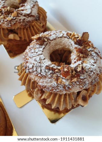 Modern french pastry on old gold plated porcelain