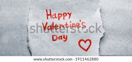 Happy Valentine's Day card handmade with heart on the background of kraft paper and copy space