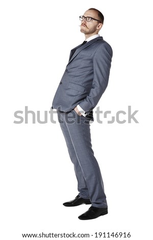 Studio shot of cocky businessman. Isolated on white. Copy space. 