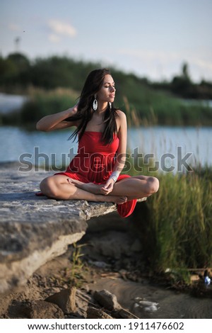 lifestyle photo of woman with perfect hair.walking alone at the beach.Sensual young girl relaxing.Colorful filter.glam style,teen trend outfit, positive mood,smiling,amazing model girl,long hair Royalty-Free Stock Photo #1911476602