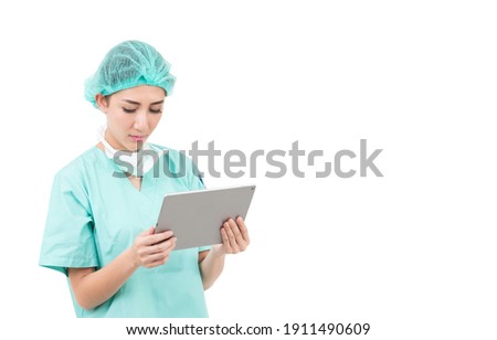 asian woman doctor use digital tablet in operating room