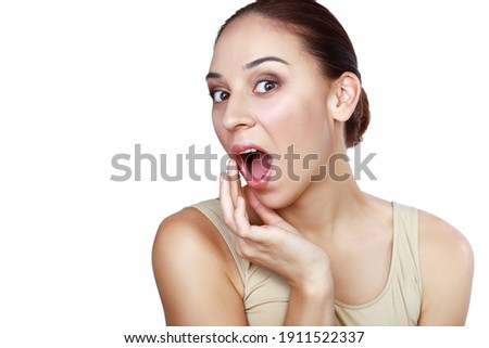 Close up portrait of wondering woman looking at camera isolated on white background