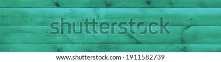Abstract Wooden Fence Green Color Material. Barn Wall Toned In Light Blue. Isolated Loft Natural Wood Shabby Wall. Green Seamless Texture Panoramic Banner.