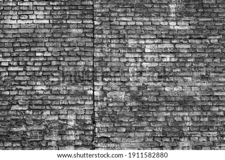 Rough Dark Grey Brick Wall Surface. Old Blocks Grunge Material Filtered. Faded Distressed Mortar Brickwall.