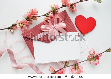 Valentine's Day greeting card design. beautiful bouquet of colorful flowers, red heart and space for text 