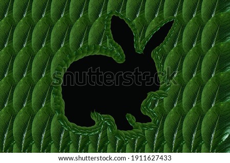 Easter bunny from green leaves. Flat lay. Natural spring concept